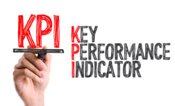 Hand with marker writing KPI - distribution KPI