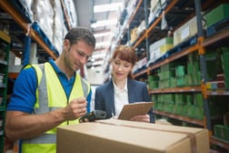 manual worker and manager scanning package in the warehouse, warehouse training tips 